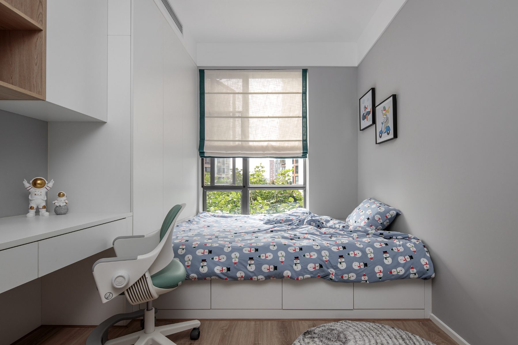 Children's window daybed with drawer storage and desk chair